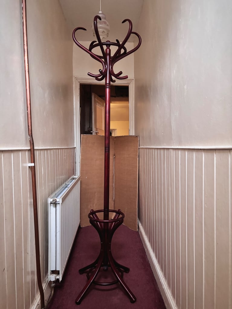 Dark wood coat stand
