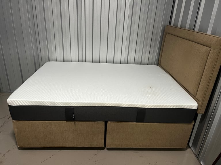Double bed with head board and Emma memory foam mattress. 