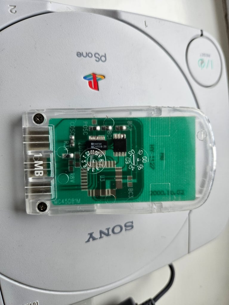 PlayStation One mini, two handsets and memory