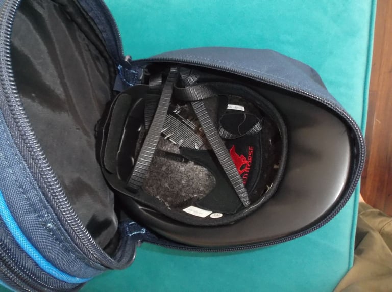Childs horse riding safety helmet and storage bag