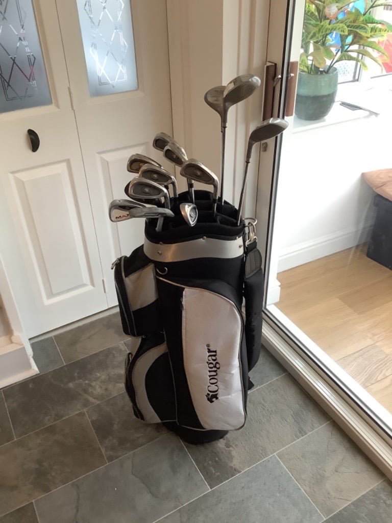 Complete set of Cougar golf clubs, in a lovely Cougar golf bag. in