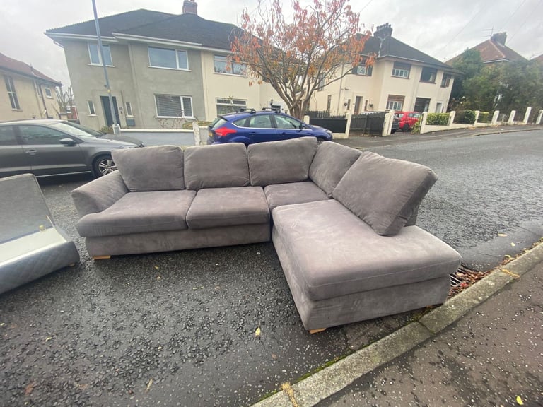 Corner group sofa in a quilted fabric with matching ottoman footstool   Only £199