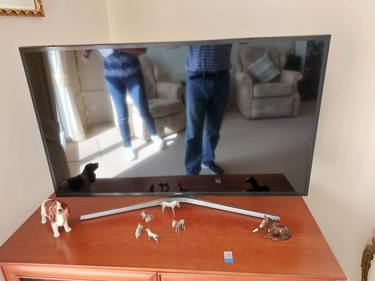Wooden TV cabinet with double front oping glass doors