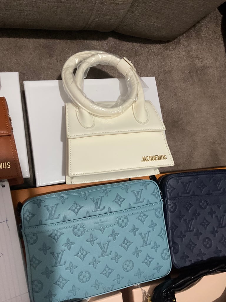 Assortment of designer women’s handbags