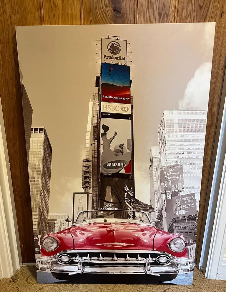 Two vintage car canvases 