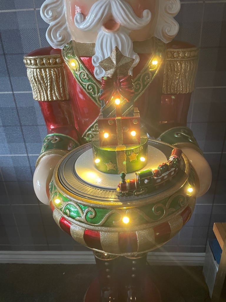 Large Christmas nutcracker 5ft tall lights up and plays music. Like new
