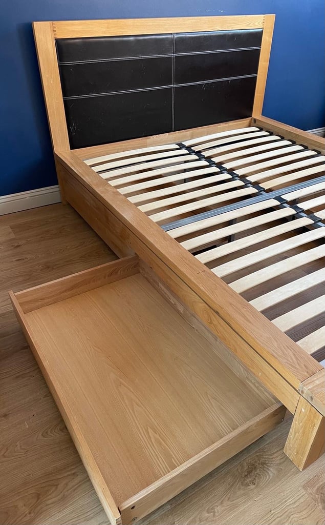 Oak King Size Wooden bed frame with four underbed wheeled drawers 