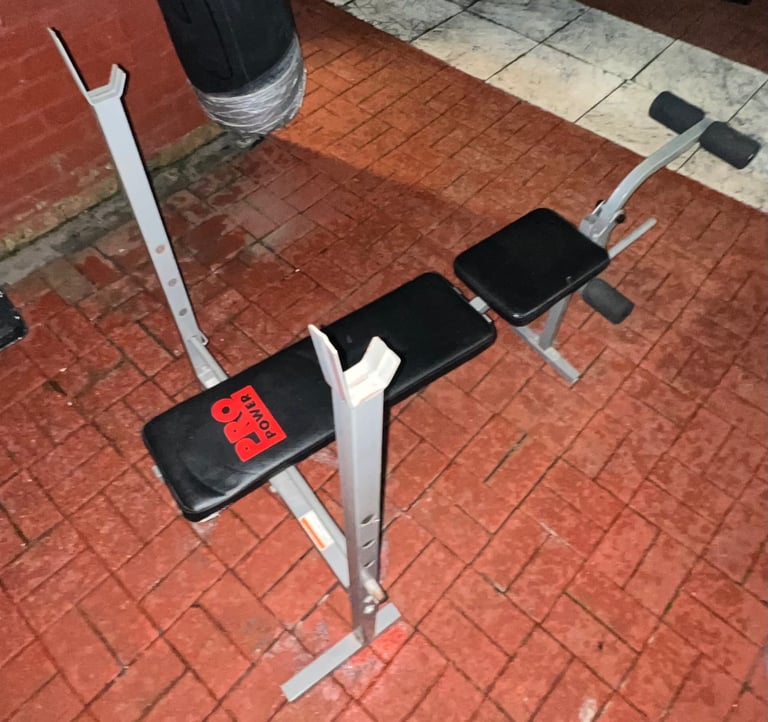 Weight lifting bench and 80 kgs worth of plates 