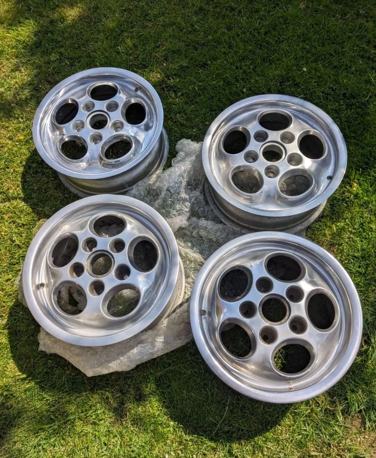 Set of 4 Porsche polished teledial wheels