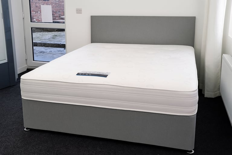 image for Chic Divan Bed with Optional Storage and Upholstered Headboard for Luxury Living