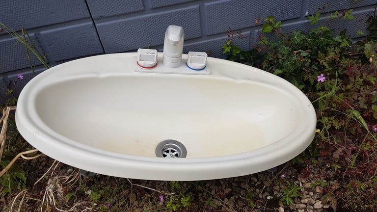 Bathroom sink with mixer tap.
