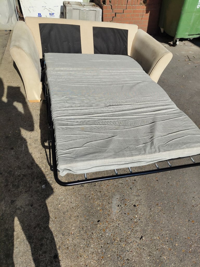 image for Beige pull out sofa bed futon in good condition 