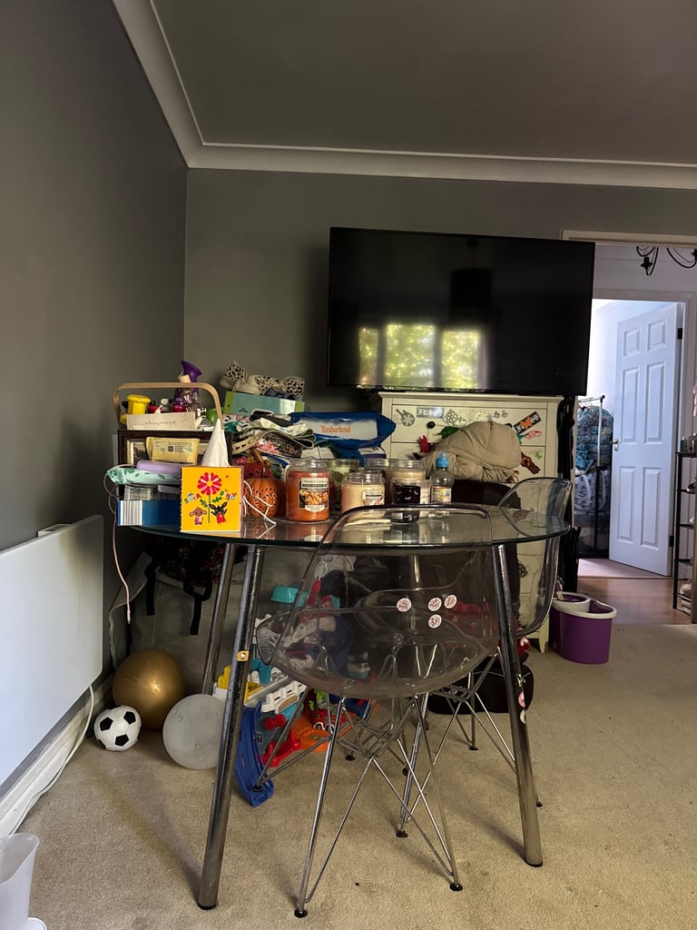 Glass table matching plastic chairs