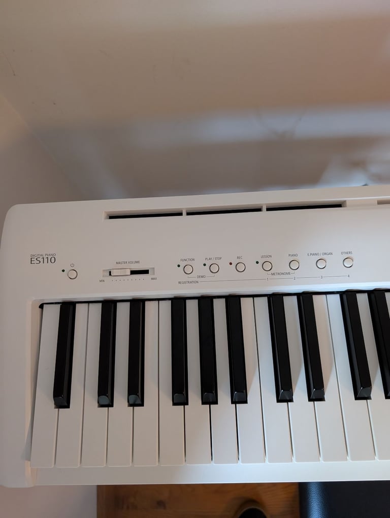 Kawai ES110 Digital Piano with stand, stool and pedal.