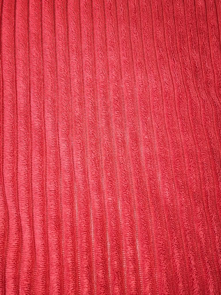 2 red velour cushions