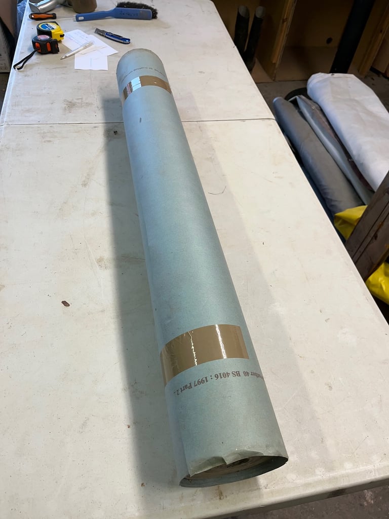 Rolls of building paper and vapour barrier