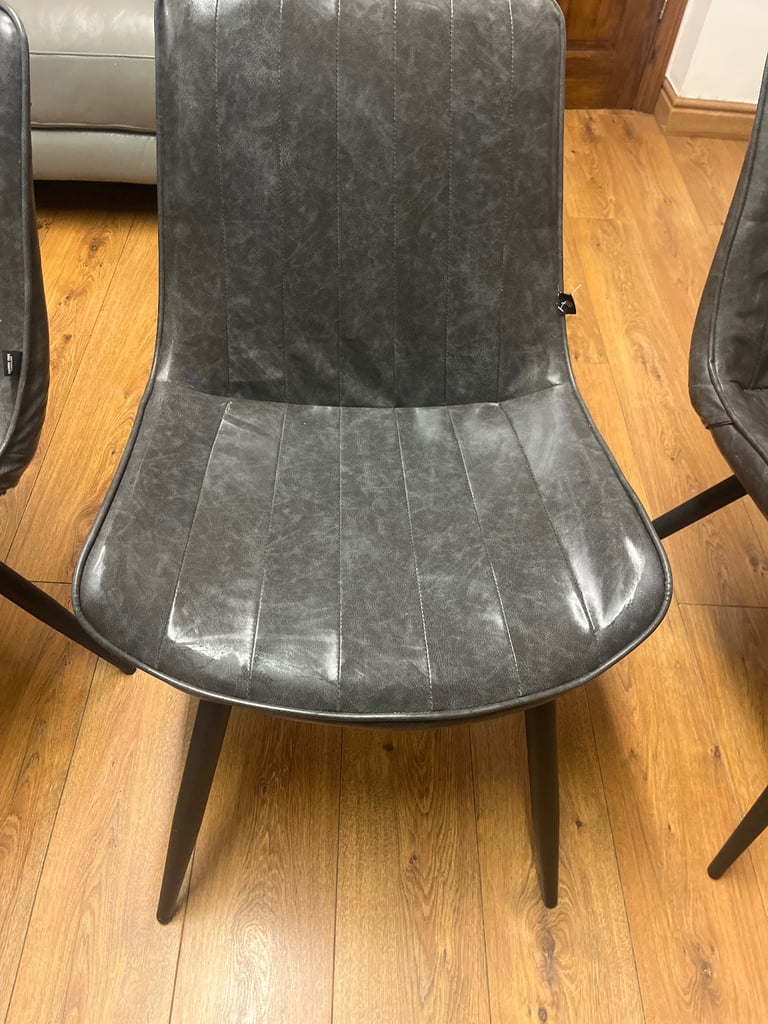image for Faux leather dinning chairs 