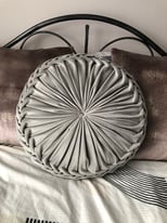 Round bedroom bed grey cushions 
