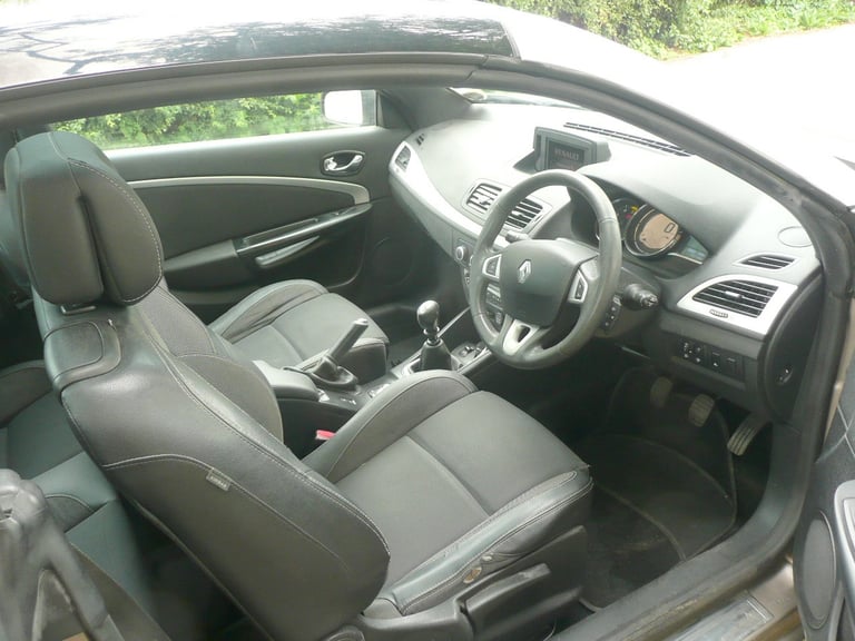 2012, 1.9 diesel Renault Megane convertible.