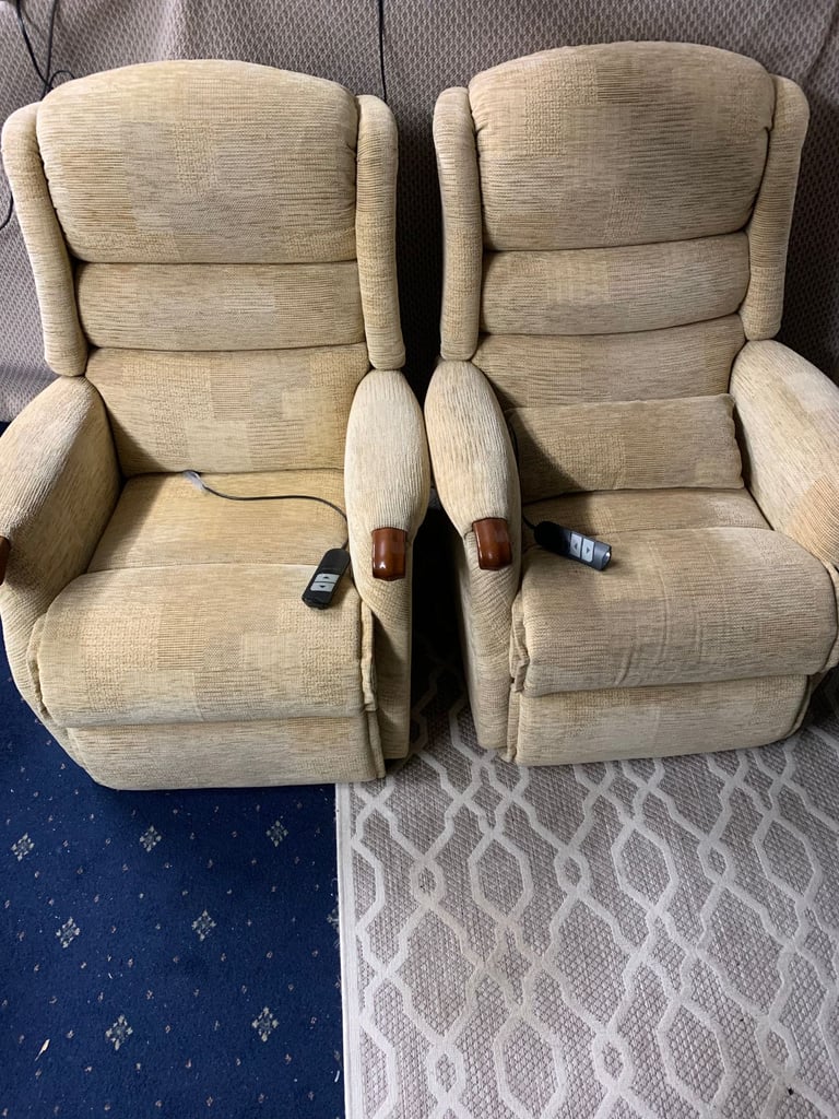 image for Two cream fabric armchairs can deliver locally