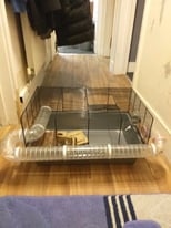 Hamster cage with running tube 