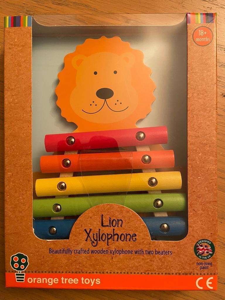 Lion Xylophone, boxed, new. 