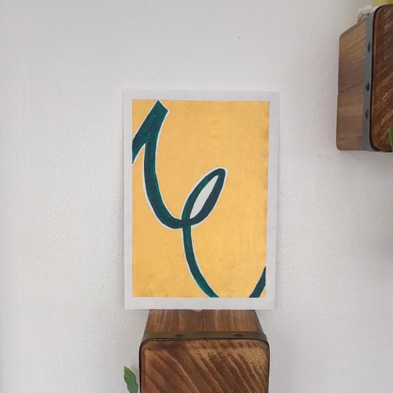 Gold and green abstract art work   