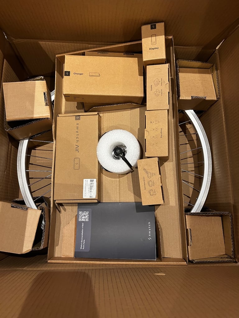 Brand new Swytch electric bike conversion kit with accessories