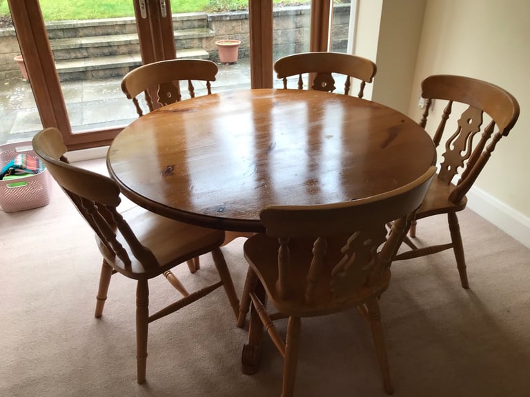 Pine table and 5 chairs 