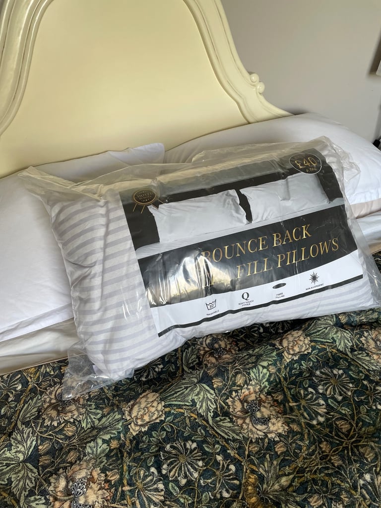 Pair of brand new bounceback extra fill hypoallergenic pillows