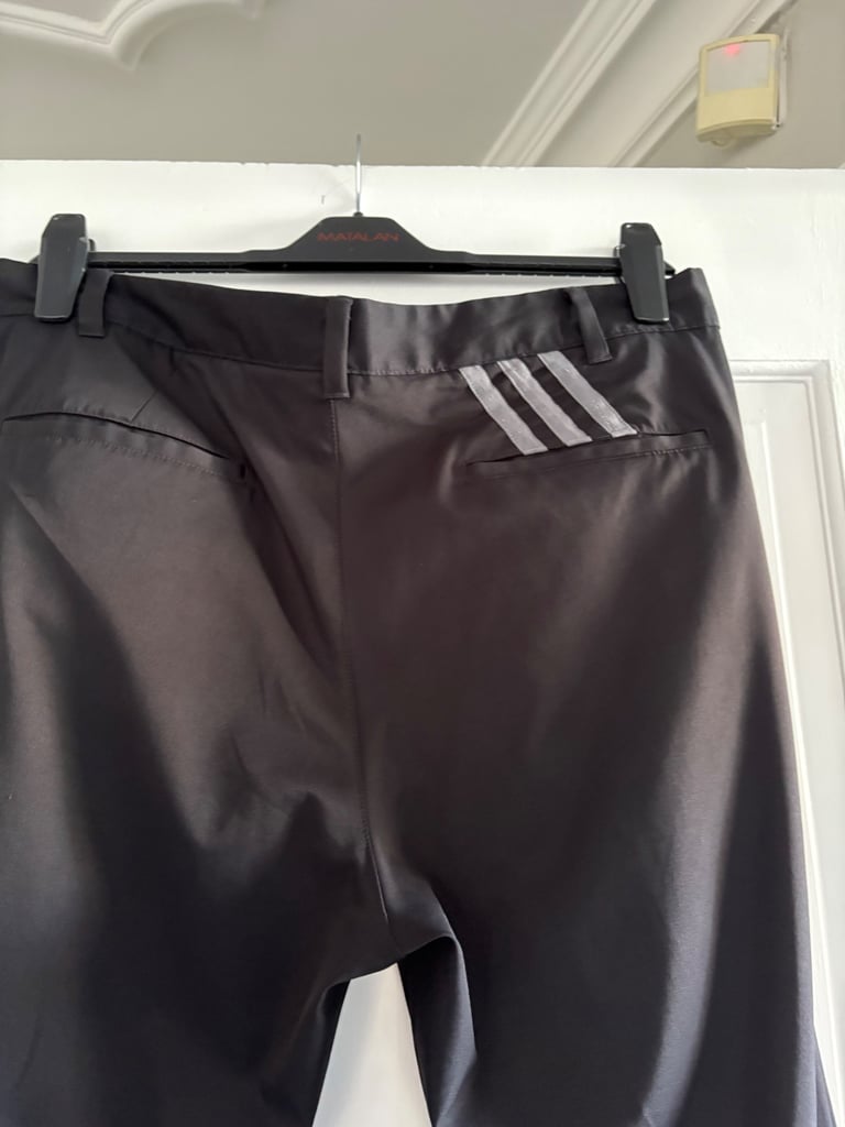 image for Men’s black adidas golf trousers 