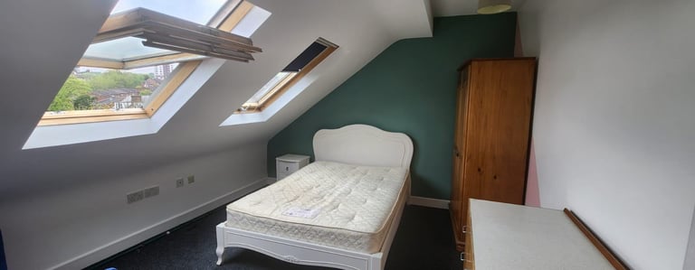 Shared Room for Rent in a Spacious House at S6