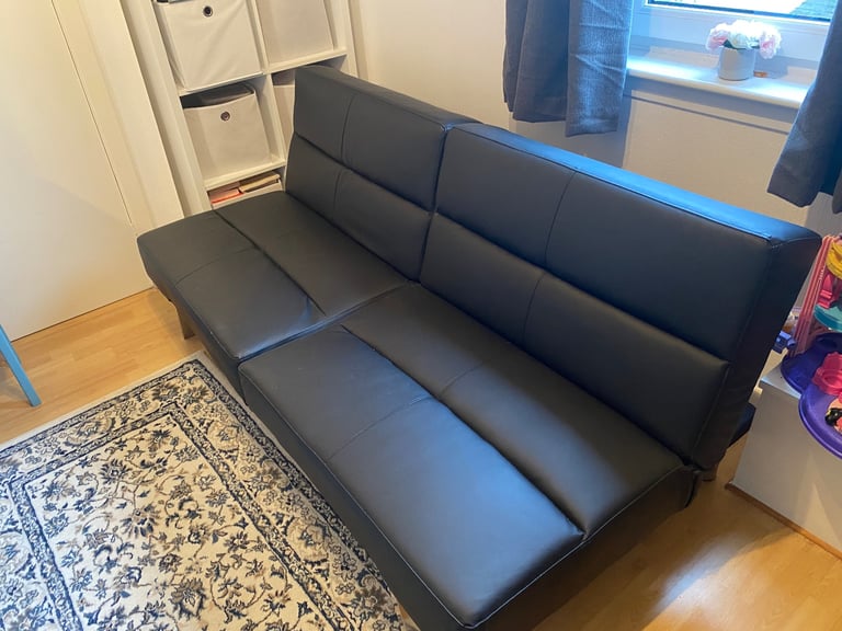 Faux leather sofa bed