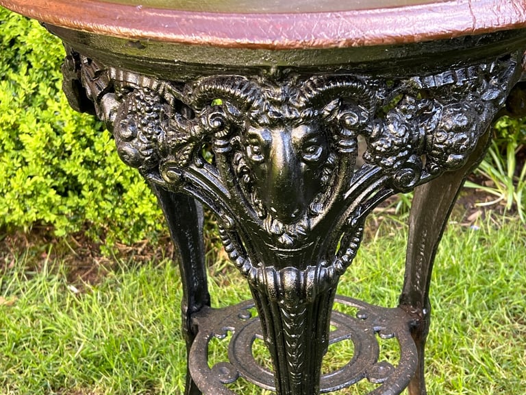 image for Cast iron ram's head design pub table