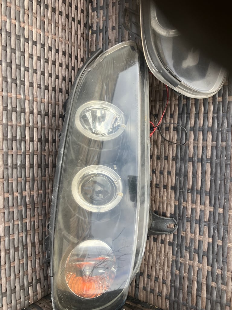 Omega headlights