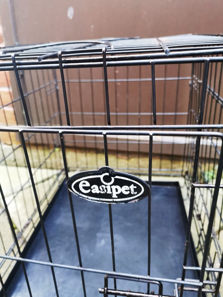 EASIY PET BLACK STEEL DOG CRATE / CAGE FOR SALE dimensions   L. 24  W. 18  H. 20 inches)
