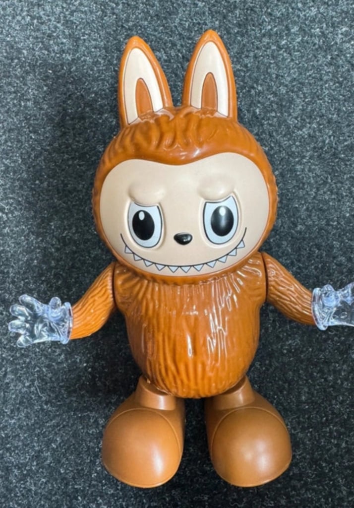 image for Labubu swinging feet shining body