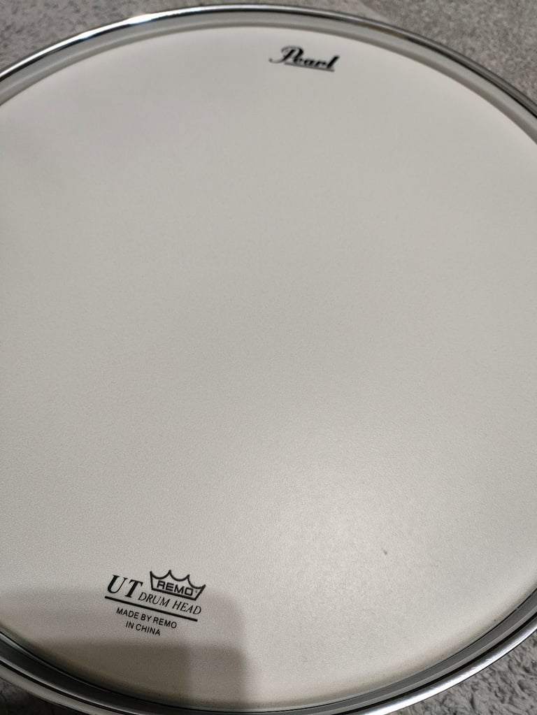 Pearl Remo drum and drumsticks 