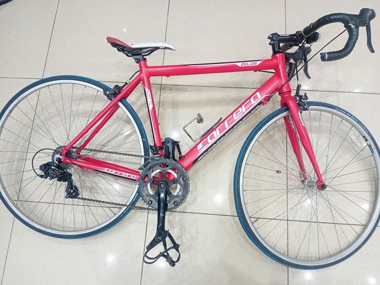 26 inch red adult Carrera Zelos road bike