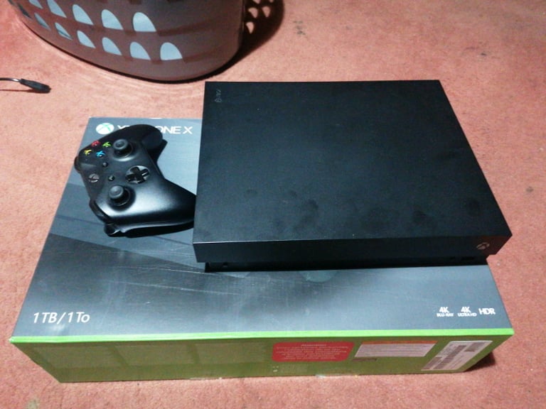 Xbox One X 1TB. Boxed as New 