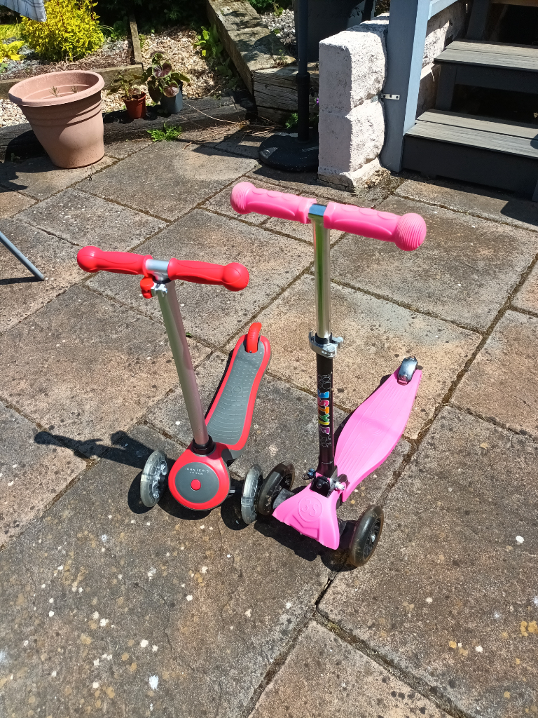 Two Small Childrens Scooters 