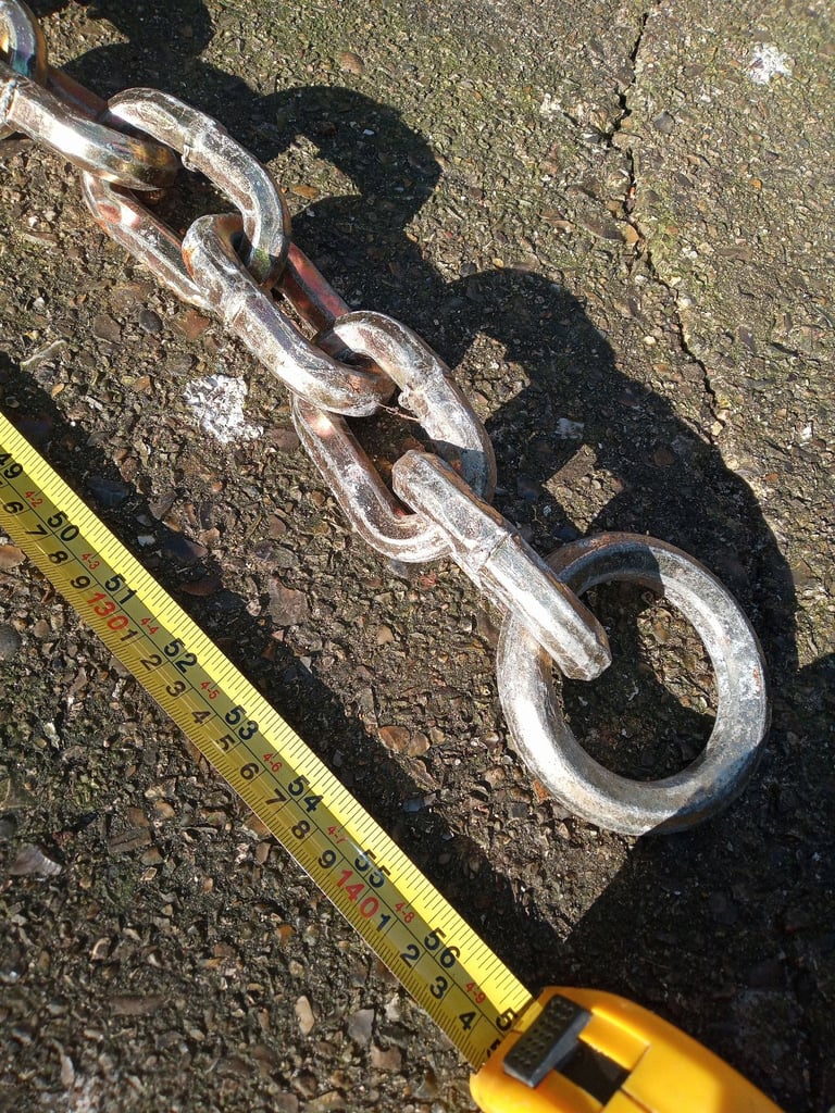 Hardened steel chain 56" long.