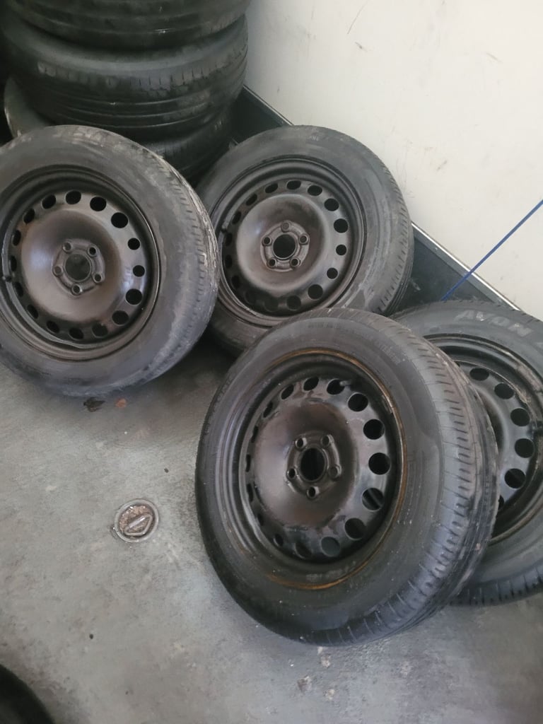 4x ford 5x 108pcd wheels and good tyres size 205 60 16 