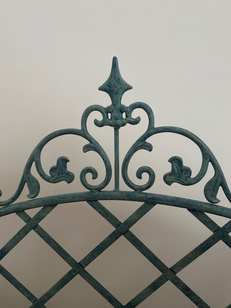 Green metal double bed headboard 