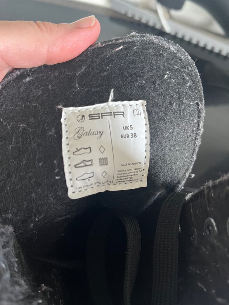 Black ice skates UK size 5, skate bag and blade guards