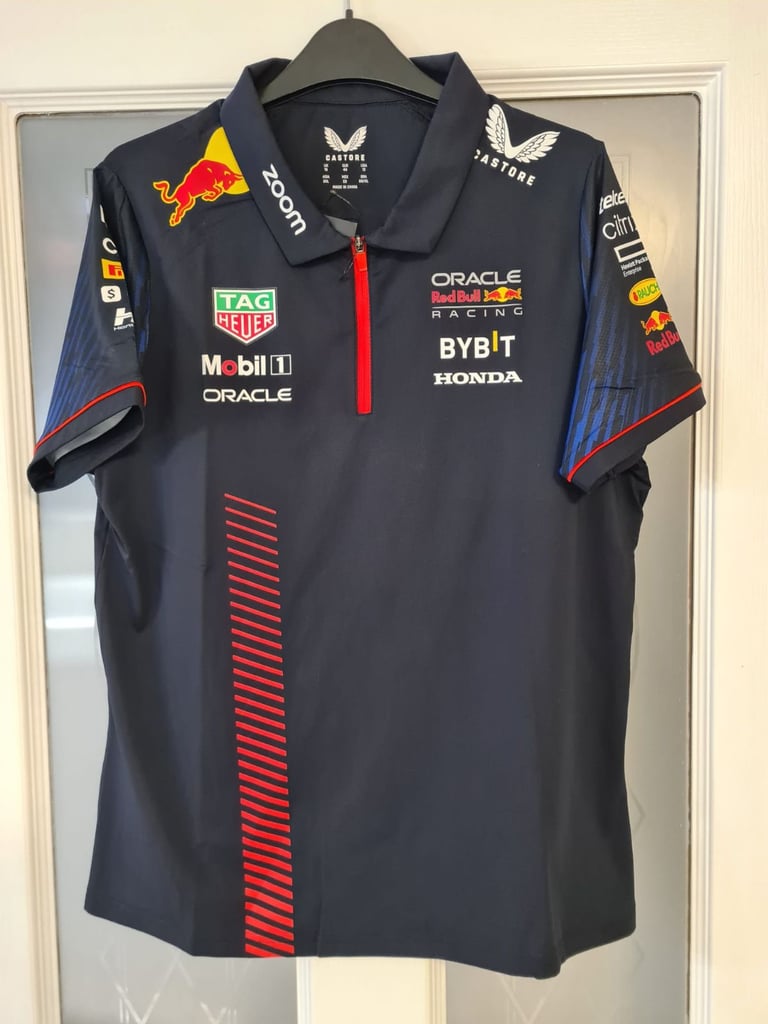 image for Red Bull Womens F1 Polo Castore team top  Sizes 16 & 14