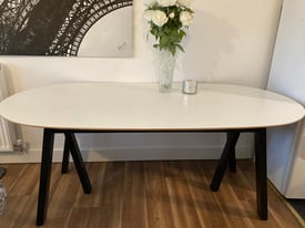White and Black Oval Table
