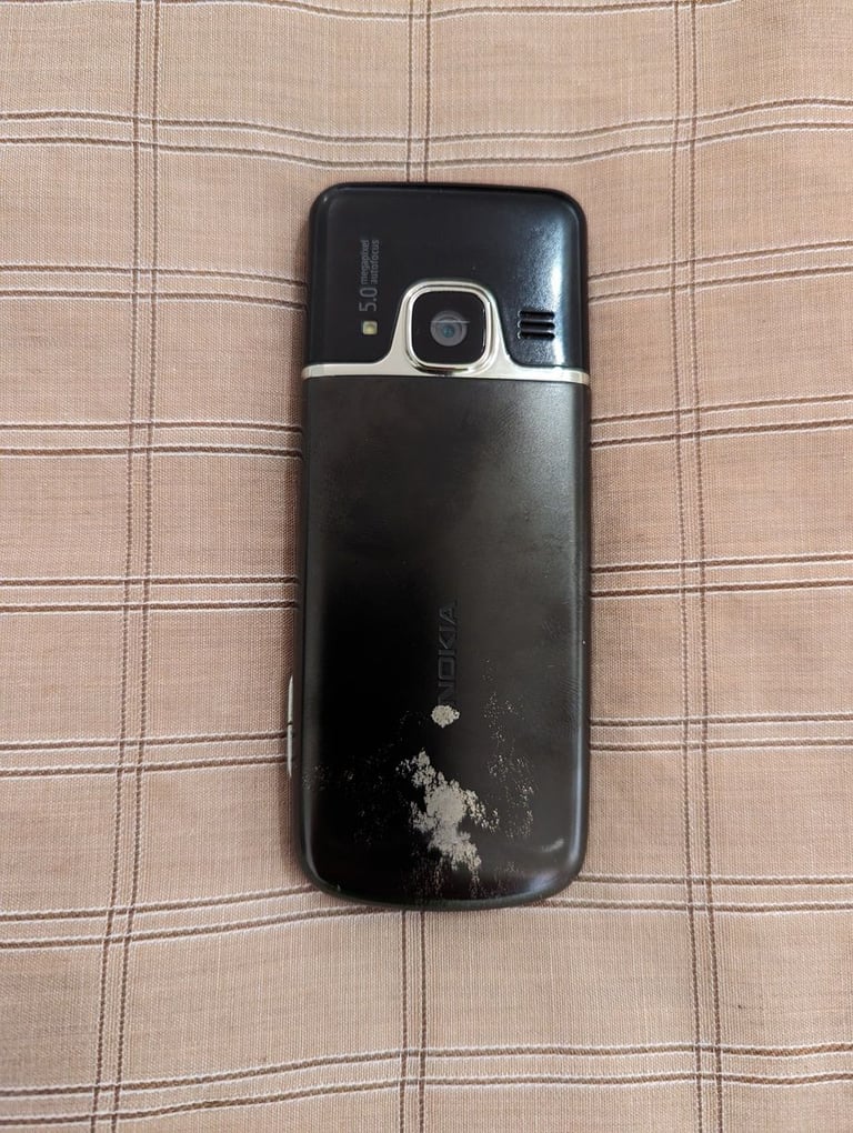 Nokia 6700 Classic with box, charger manual and accessories shown - retro vintage