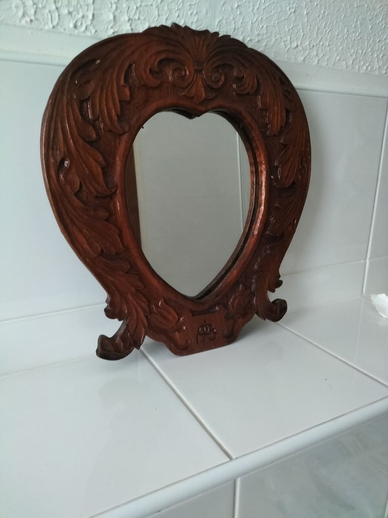 Hand carved wooden mirror frame