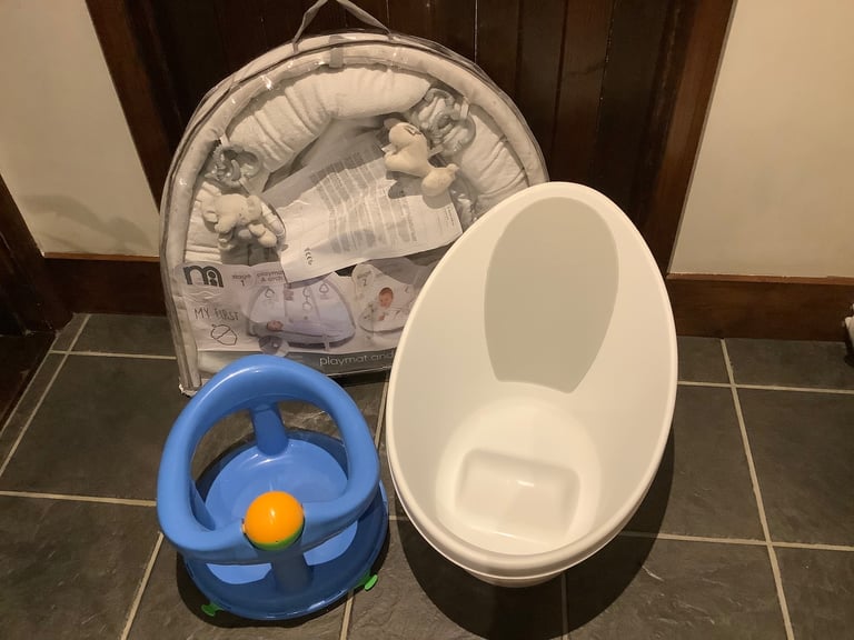 image for Baby equipment includes a bath, a bath chair and a mothercare playmat. 